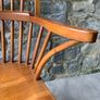 A large oak Windsor armchair. Image 5