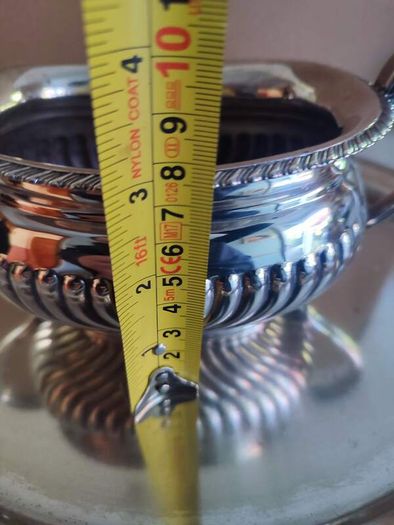 Vintage from the 19th century. Antique Period English Tea Service inc Teapot, Sugar bowl & milk jug Sheffield England on small silver plated tray.