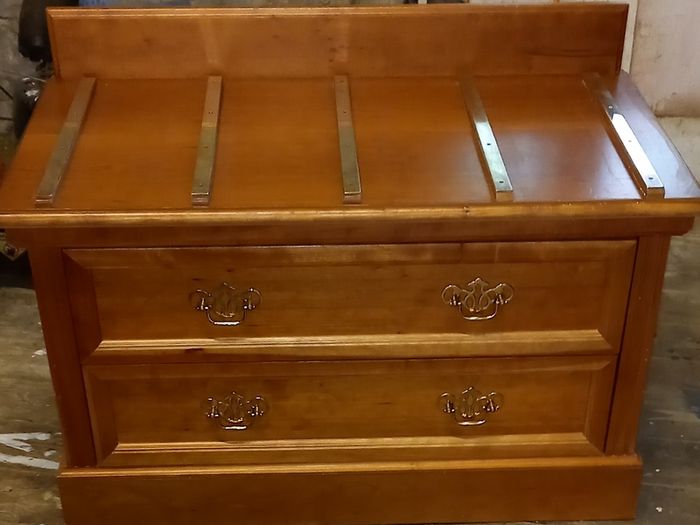 Chest with suitcase set down on top