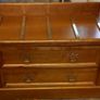 Chest with suitcase set down on top Image 2