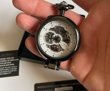 Kronen & Sohne mechanical skeleton pocket watch with chain and box