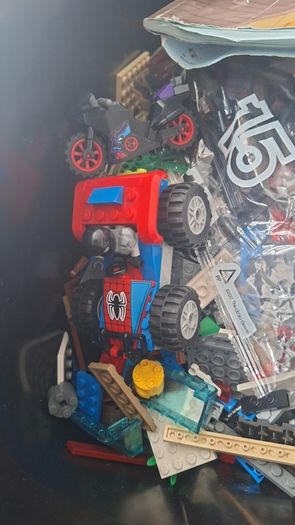Large box of lego , accessories and weapons