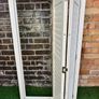 Vintage-style louvered white internal window shutter Image 3