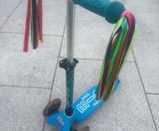 Mini micro scooter with micro scooter tassels
