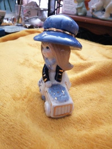 Porcelain girl figurine