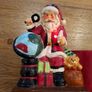 Santa Ceramic Flashing Light plays tunes and small plant holder Image 3
