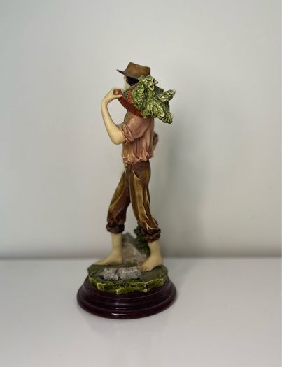 Boy with a basket figurine signed Ballester