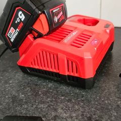 Milwaukee M18 5Ah Battery with Milwaukee M12-18 FC 12/18V Fast Charger.