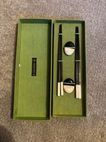 A Set of Vintage Chopsticks with Chopstick Rests
