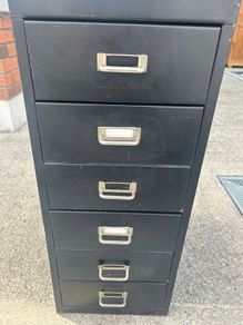 Vintage metal cabinet with drawers