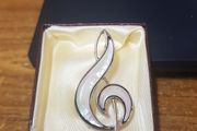 Modern Music Note brooch.