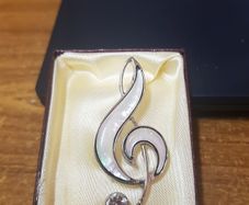 Modern Music Note brooch.