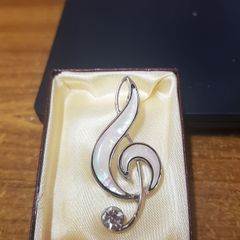 Modern Music Note brooch.