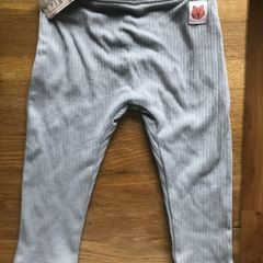 Brand new with tags marks & Spencer dusky blue ribbed trousers/joggers with tiger motif size 9-12 months