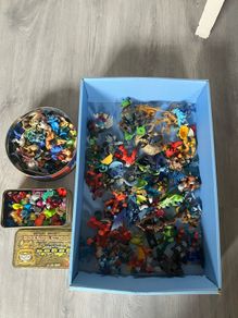 Collection of gogo and animal figures and assorted toys