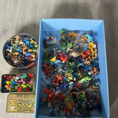 Collection of gogo and animal figures and assorted toys