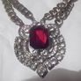 a lovely vintage  costome jewelley pendent with white stones and a large red stone Image 2