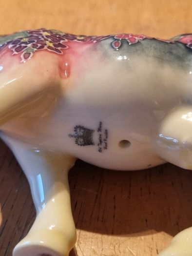 Porcelain colorful cow figurine