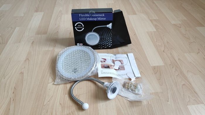 Flexible and detachable make up/shaving mirror with LED light.
