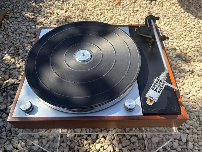 Absolutely immaculate factory condition Thorens Td 150 Mark II. With original side cut dust cover in incredible condition after 55 years. Hand-built in Switzerland and Germany and one of the most famous and highly-regarded turntables ever made.