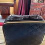 Estee Lauder Vanity case in black with applique style design in the front and a nice bow style handle on top Image 4