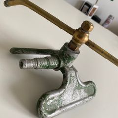 Antique revolving garden sprinkler