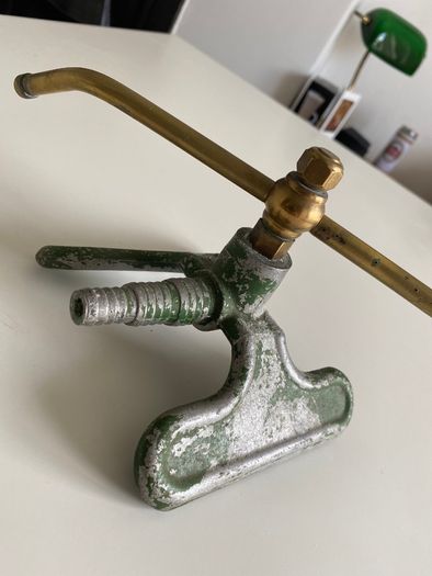 Antique revolving garden sprinkler