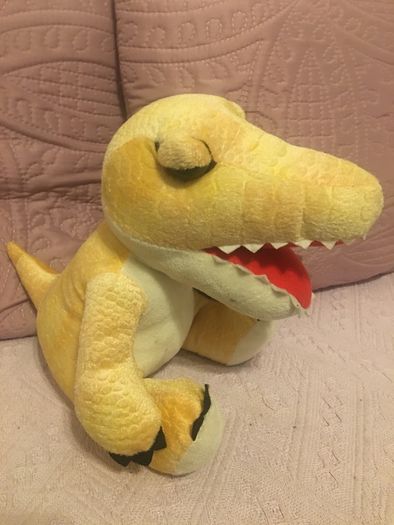 Plush dinosaur/ baby crocodile soft toy.