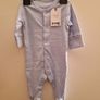 A selection of brand new baby clothes and items Image 10
