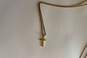 Gold cross.