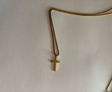 Gold cross.