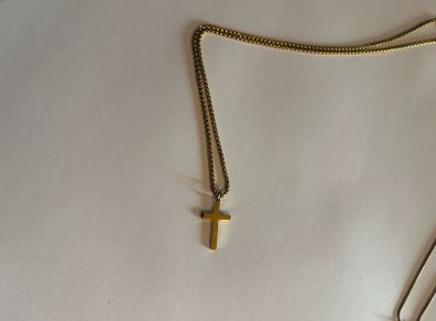 Gold cross.
