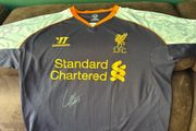 Luis Suarez signed Liverpool jersey