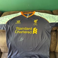 Luis Suarez signed Liverpool jersey