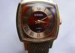 Vintage SEKONDA 1960/70s ladies wristwatch . Original Soviet production. Dial finished in burgundy and gold with black Roman numerals. Hand winding in full working order. Face showing 17 Jewels USSR. First class movement