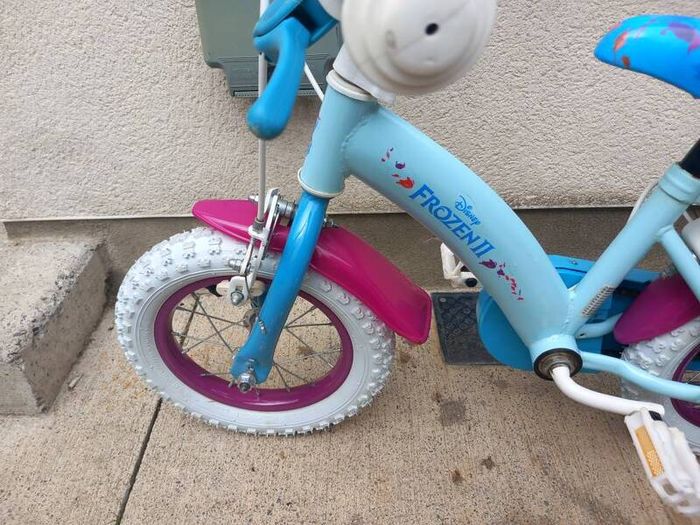 Kids frozen bike size 12 inch wheels.