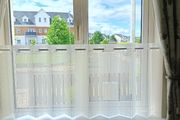 Cream pleated cafe nets and assorted tension rods to suit
