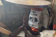 Round pedestal side table - dark wood finish