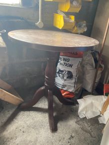 Round pedestal side table - dark wood finish