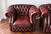 Beautiful matching pair of Oxblood leather Chesterfield armchair