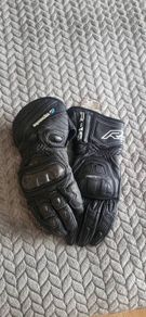 Motorcycle gloves with a special elastic band for wiping windshields while riding a bike. In excellent condition. Size 10.