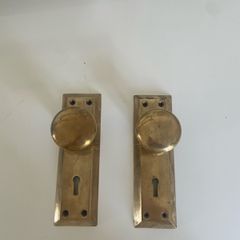 Unlaquered brass door handle