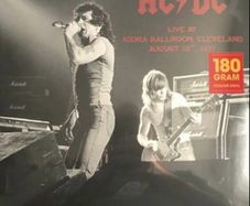 AC/DC limited edition orange coloured vinyl record. Mint condition. Recorded live at the Agora Ballroom Cleveland August 22nd 1977