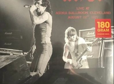 AC/DC limited edition orange coloured vinyl record. Mint condition. Recorded live at the Agora Ballroom Cleveland August 22nd 1977