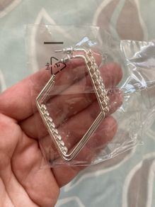Brand new pair of earrings with bling