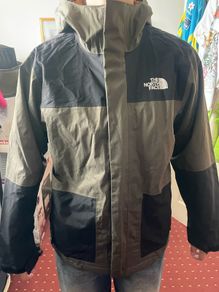 The North Face boys rain jacket size L