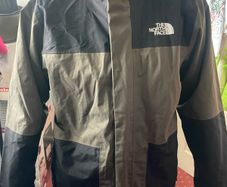 The North Face boys rain jacket size L