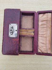 Antique leather case for small jewelry and a watch