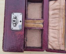 Antique leather case for small jewelry and a watch