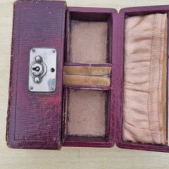Antique leather case for small jewelry and a watch